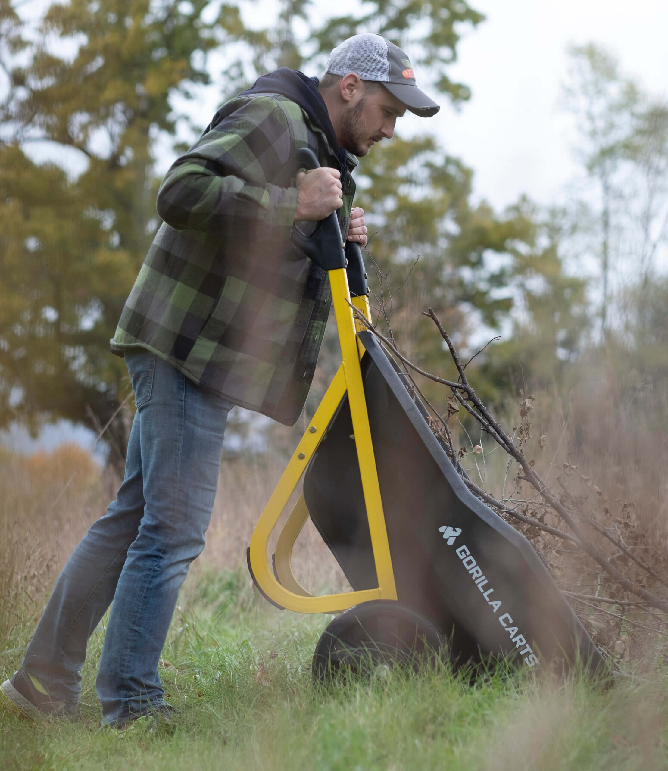 man dumping contents from a GCR-7 on the ground